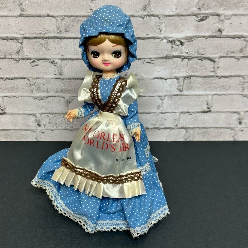 Vintage 1983 New Orleans World's Fair Big Eyes Doll Dress Bonnet Stand 10 in.